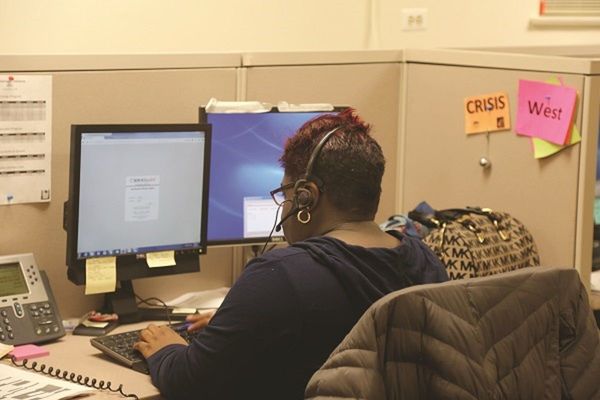 A call center operator helps connect callers to financial assistance for rent, mortgage, and utilities payments. Photo credit: Catholic Charities Chicago, Homelessness Prevention Call Center.
